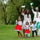 african-family-traditional-clothes-with-nigerian-flags-park (1)