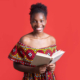 attractive-young-woman-traditional-dress-with-book-her-hands (1)