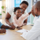 high-five-doctor-family-with-girl-her-parents-hospital-consulting-appointment-healthcare-medicine-trust-support-medical-clinic-with-health-professional (1) (1)