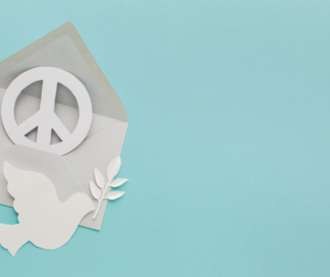 top-view-paper-dove-with-envelope-peace-sign (1)